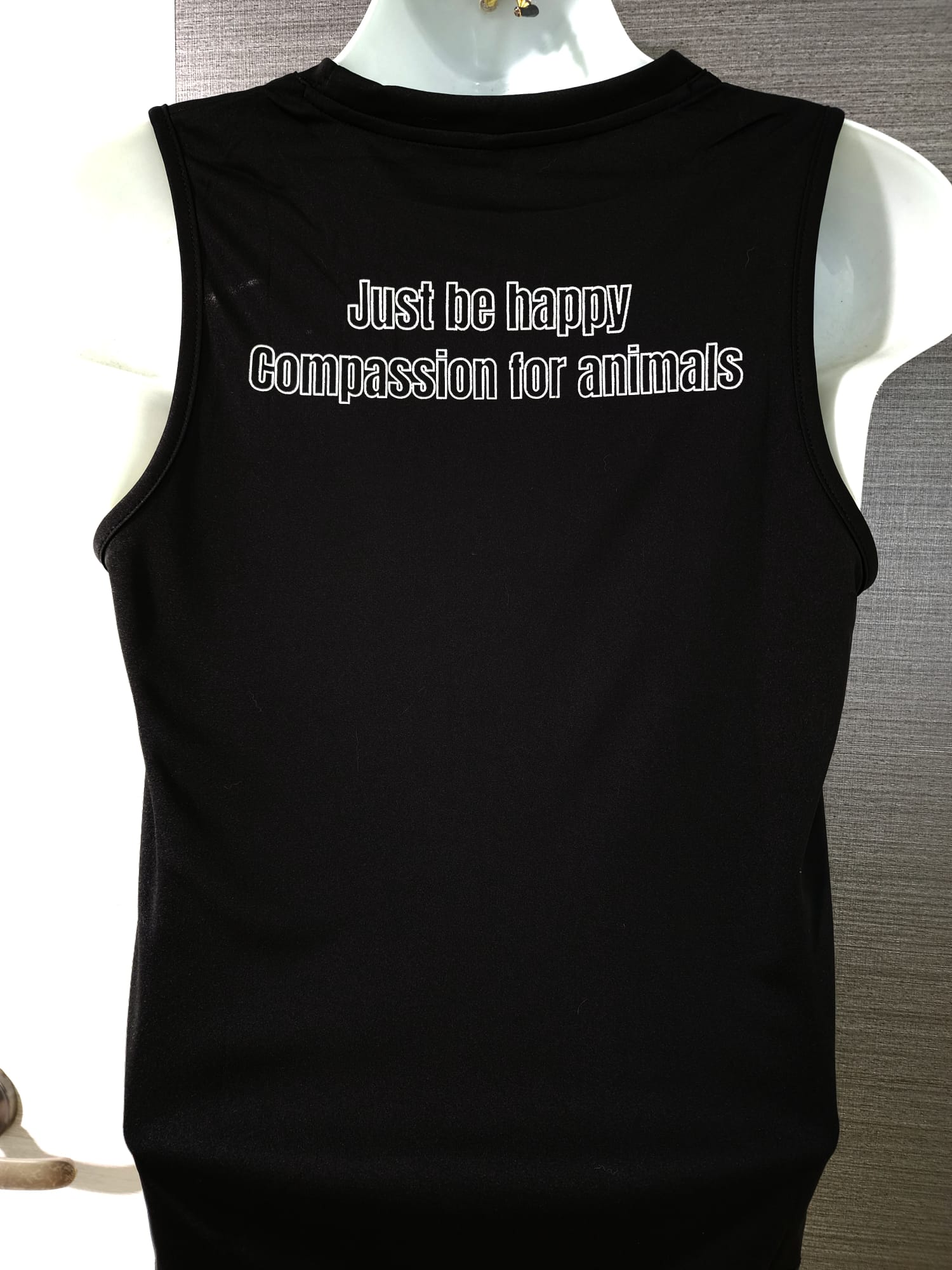 NEW! Sleeveless Black Dri-fit with Silver Font $24.50.