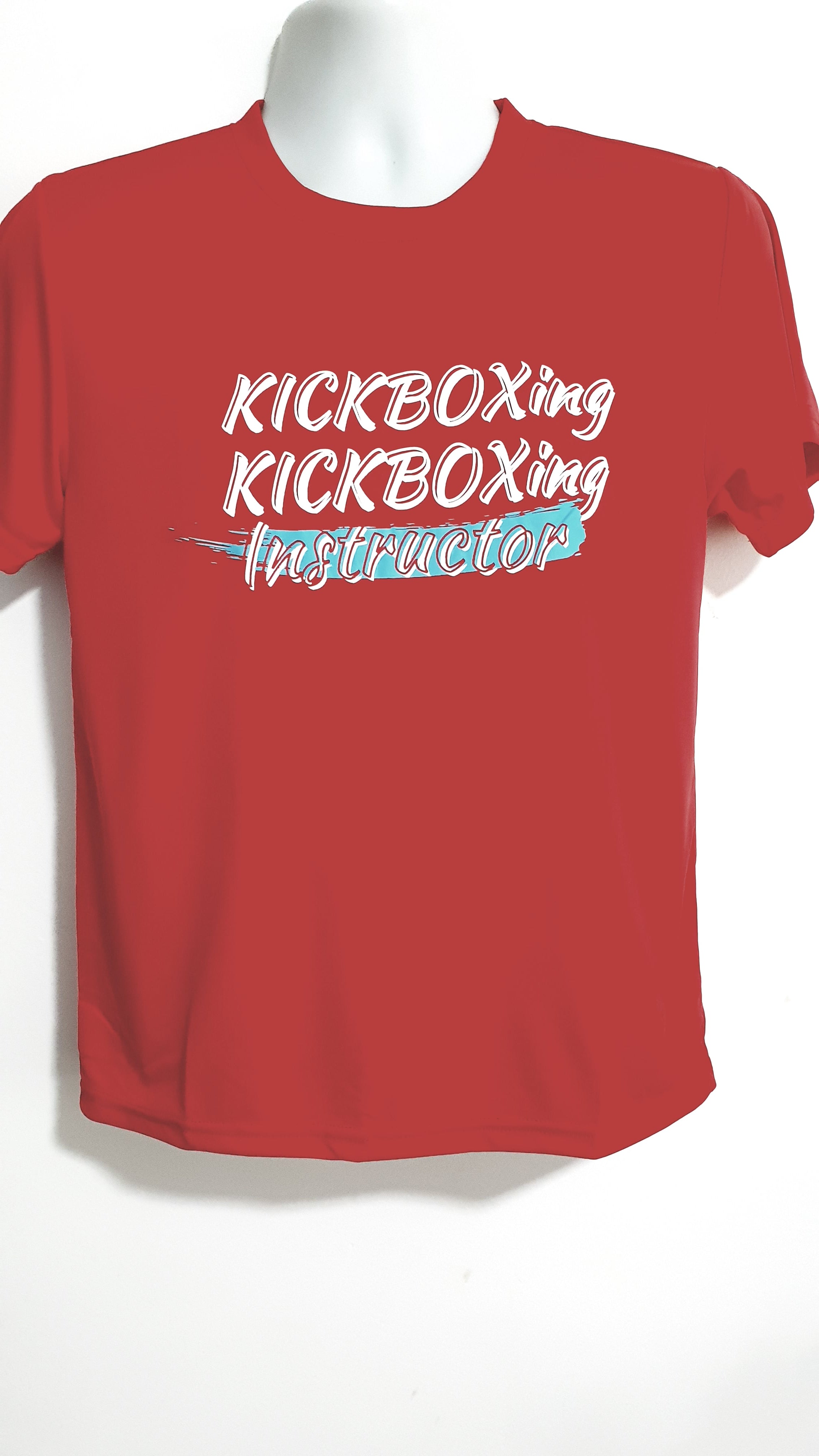 Kickbox Instructors printed on Deep Red Dri-Fit sleeve